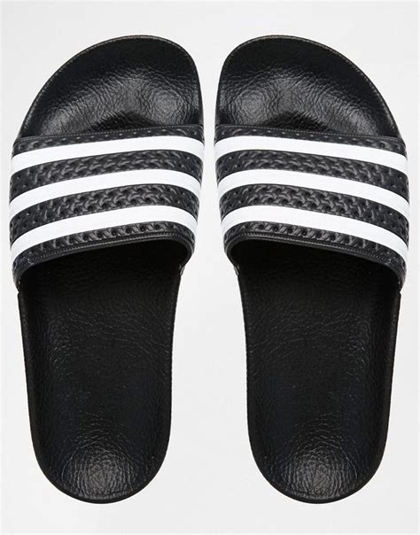 adidas schuh weiss lochmuster schwarze stripes|adidas striped sandals.